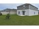 Expansive backyard with lush green grass, ideal for outdoor activities and Gathering enjoyment at 1902 Presley Pl, Kissimmee, FL 34746