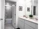 Bathroom with double sinks and mirrors for a modern and spacious feel at 1902 Presley Pl, Kissimmee, FL 34746