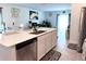 Bright, open kitchen featuring stainless steel appliances, a stylish island and modern finishes at 1902 Presley Pl, Kissimmee, FL 34746