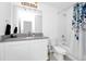 Bright bathroom featuring a single vanity and shower with tub combination at 2126 Derwent Dr, Davenport, FL 33896