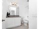 Bright bathroom featuring a single vanity and shower with tub combination at 2126 Derwent Dr, Davenport, FL 33896
