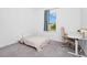 Cozy bedroom featuring natural light, a neutral color scheme, and a comfortable workspace at 2126 Derwent Dr, Davenport, FL 33896