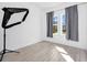 Empty bedroom with wood-look floors and windows with curtains at 2126 Derwent Dr, Davenport, FL 33896