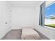 Simple bedroom with a window view and neutral decor at 2126 Derwent Dr, Davenport, FL 33896