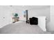 Upstairs living area featuring a couch with bench and television at 2126 Derwent Dr, Davenport, FL 33896