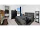 Comfortable main bedroom with window view and closet storage at 2126 Derwent Dr, Davenport, FL 33896