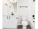 Updated bathroom with modern fixtures, including a vanity, mirror, and bathtub at 250 Lakeridge Ct, Winter Springs, FL 32708