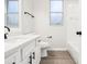 Bright bathroom featuring tile flooring, vanity, and a shower/tub combo, creating a functional and stylish space at 250 Lakeridge Ct, Winter Springs, FL 32708