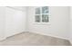 Bedroom featuring a closet and a window, offering practical and comfortable living space at 250 Lakeridge Ct, Winter Springs, FL 32708