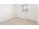 Bright bedroom with neutral carpet and a window offering natural light at 250 Lakeridge Ct, Winter Springs, FL 32708