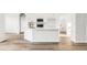 Modern kitchen with an eat-in center island, stainless steel appliances, and contemporary finishes at 250 Lakeridge Ct, Winter Springs, FL 32708