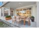 Covered patio with modern outdoor furniture, ideal for relaxing and entertaining at 250 Lakeridge Ct, Winter Springs, FL 32708