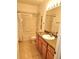 Bathroom featuring a shower/tub combo with a single vanity and tiled flooring at 25012 Chipshot Ct, Sorrento, FL 32776
