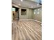 Spacious living room with wooden floors and recessed lighting at 25012 Chipshot Ct, Sorrento, FL 32776
