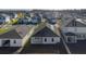 Aerial shot showcasing the home's backyard, patio and roof within a well-planned neighborhood at 2750 Slash Way, St Cloud, FL 34771