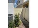 View of fenced backyard with AC unit at 2750 Slash Way, St Cloud, FL 34771