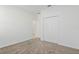 Clean bedroom with plush carpeting, neutral walls, and a large closet creates a serene and inviting atmosphere at 2750 Slash Way, St Cloud, FL 34771