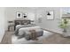 Comfortable bedroom with a plush rug, decorative pillows, and ample natural light at 2750 Slash Way, St Cloud, FL 34771
