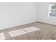 Bright, neutral bedroom features soft carpet, and a window that streams natural light throughout the room at 2750 Slash Way, St Cloud, FL 34771