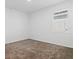 Bright bedroom with plush carpeting and natural light showcases a clean, minimalist space, ready for personalization at 2750 Slash Way, St Cloud, FL 34771