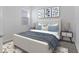 Comfortable bedroom featuring a plush bed, stylish decor, and soft, natural lighting at 2750 Slash Way, St Cloud, FL 34771