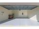 Spacious garage with newly painted floor features ample room for parking and storage, enhancing home functionality at 2750 Slash Way, St Cloud, FL 34771