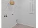 Functional laundry area with shelving and hookups for a washer and dryer at 2750 Slash Way, St Cloud, FL 34771