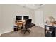 Bedroom featuring a computer desk, neutral-toned walls, carpet flooring and a standard closet at 31024 Prestwick Ave, Sorrento, FL 32776