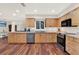 Kitchen with wood cabinets, stainless steel appliances, and ample counter space at 31024 Prestwick Ave, Sorrento, FL 32776