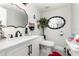 Bright half-bathroom showcasing modern fixtures, decorative mirrors, and a clean design at 3244 Amaca Cir, Orlando, FL 32837