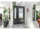 Welcoming foyer featuring a decorative glass door and elegant interior decor at 3244 Amaca Cir, Orlando, FL 32837
