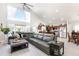 Bright, open-concept living room and kitchen area with high ceilings and lots of natural light at 3244 Amaca Cir, Orlando, FL 32837