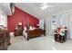 Bedroom featuring a canopy bed, a vaulted ceiling, and an abundance of natural light at 3244 Amaca Cir, Orlando, FL 32837