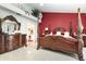 A main bedroom suite features a large vanity and an ensuite bathroom at 3244 Amaca Cir, Orlando, FL 32837