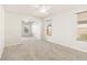Comfortable bedroom with natural light and neutral carpet, providing a relaxing atmosphere at 330 Osprey Lakes Cir, Chuluota, FL 32766
