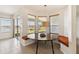 Charming breakfast nook with views, featuring a round table and comfortable banquette seating at 330 Osprey Lakes Cir, Chuluota, FL 32766