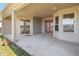 A spacious, covered patio offers an ideal outdoor extension with sliding door access to interior at 330 Osprey Lakes Cir, Chuluota, FL 32766