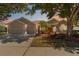 Charming home with a two-car garage and manicured landscaping at 330 Osprey Lakes Cir, Chuluota, FL 32766