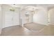 Bright foyer with arched doorways and neutral colors at 330 Osprey Lakes Cir, Chuluota, FL 32766