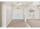 Bright foyer with neutral colors and tile flooring at 330 Osprey Lakes Cir, Chuluota, FL 32766