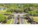 An aerial view of the community's ornate and well-maintained gated entrance at 330 Osprey Lakes Cir, Chuluota, FL 32766