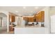 Bright kitchen with stainless steel appliances and granite countertops at 330 Osprey Lakes Cir, Chuluota, FL 32766