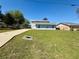 Charming home with a well-manicured lawn, perfect for outdoor activities and curb appeal at 38 Juniper Pass Dr, Ocala, FL 34480