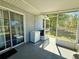 Enclosed patio with sliding glass door to backyard at 38 Juniper Pass Dr, Ocala, FL 34480