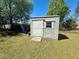 Backyard shed on a sunny day at 38 Juniper Pass Dr, Ocala, FL 34480