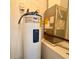 The utility room features a RUUD water heater and HVAC at 38 Juniper Pass Dr, Ocala, FL 34480
