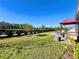 Expansive backyard with lush green grass and a paver patio, ideal for outdoor activities and relaxation at 4562 Tribute Trl, Kissimmee, FL 34746