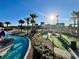 Aerial view of the community water park, with lazy river and mini golf at 4562 Tribute Trl, Kissimmee, FL 34746