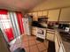 Functional kitchen with white appliances and ample cabinet space at 46 Silver Park Cir, Kissimmee, FL 34743