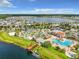 Community with beautiful lake view, resort-style pool, and many outdoor activities for its residents at 4704 Sleepy Hollow Dr, Kissimmee, FL 34746